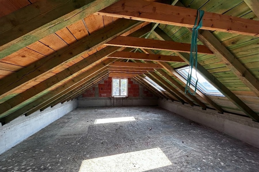 Convertible attic with wooden beams and skylights, Korcula