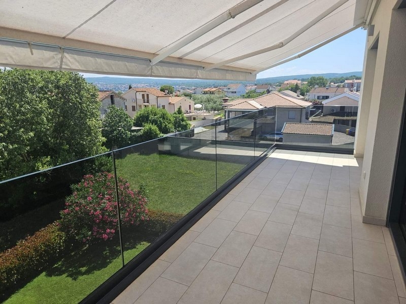 Covered balcony with a view of Malinska and the sea