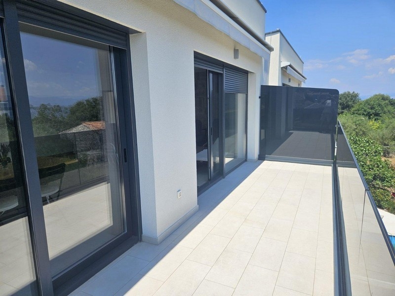 Balcony with sliding doors and sea views