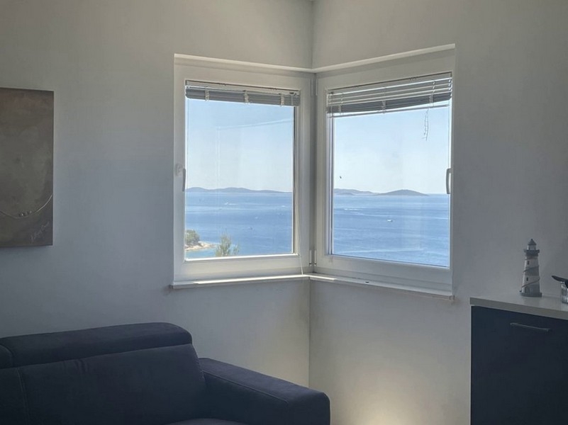 Corner window with a view of the sea and the islands off Murter