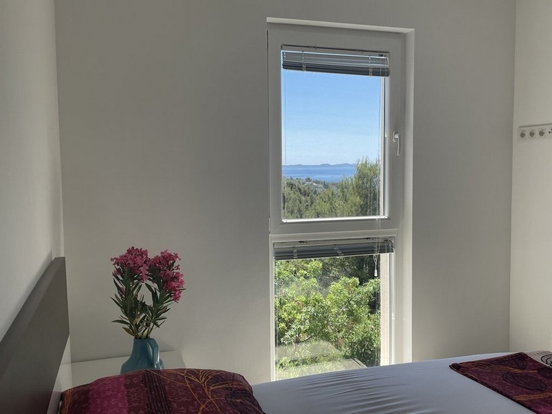Bedroom with window view of the sea, apartment Murter