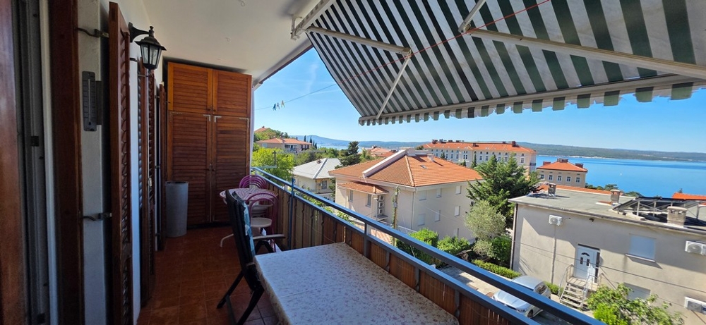Covered terrace with a view over Crikvenica to the sea, apartment A4103