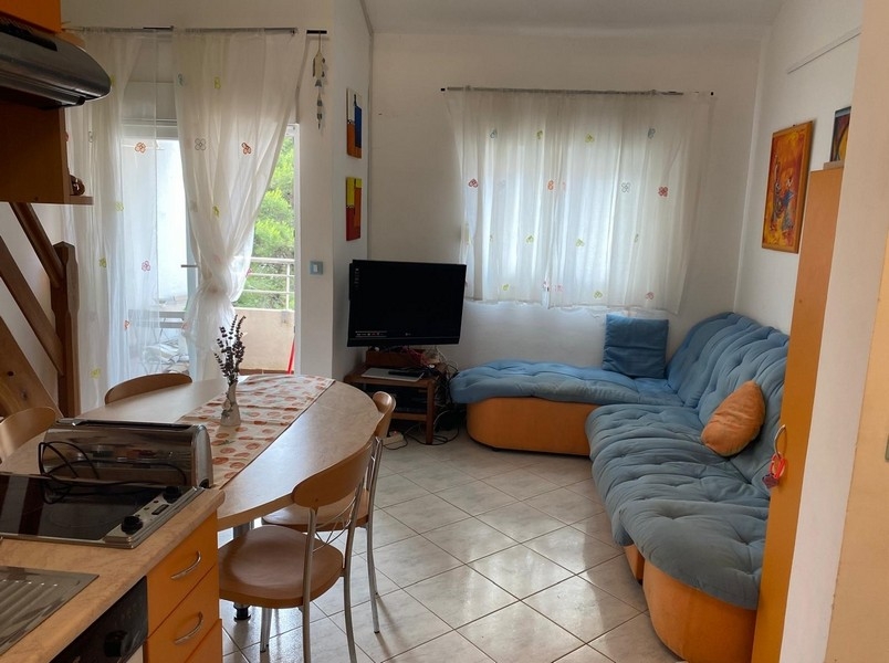 Living room with sofa and patio door