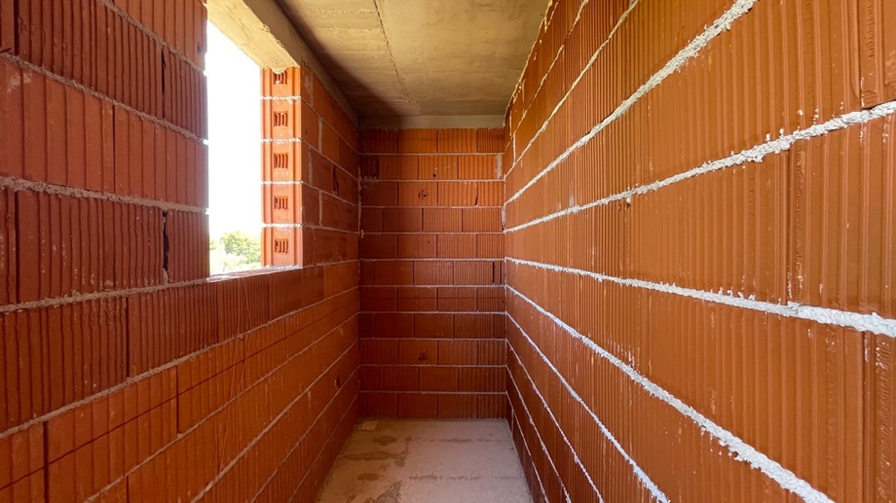 Shell of the apartment with brick walls