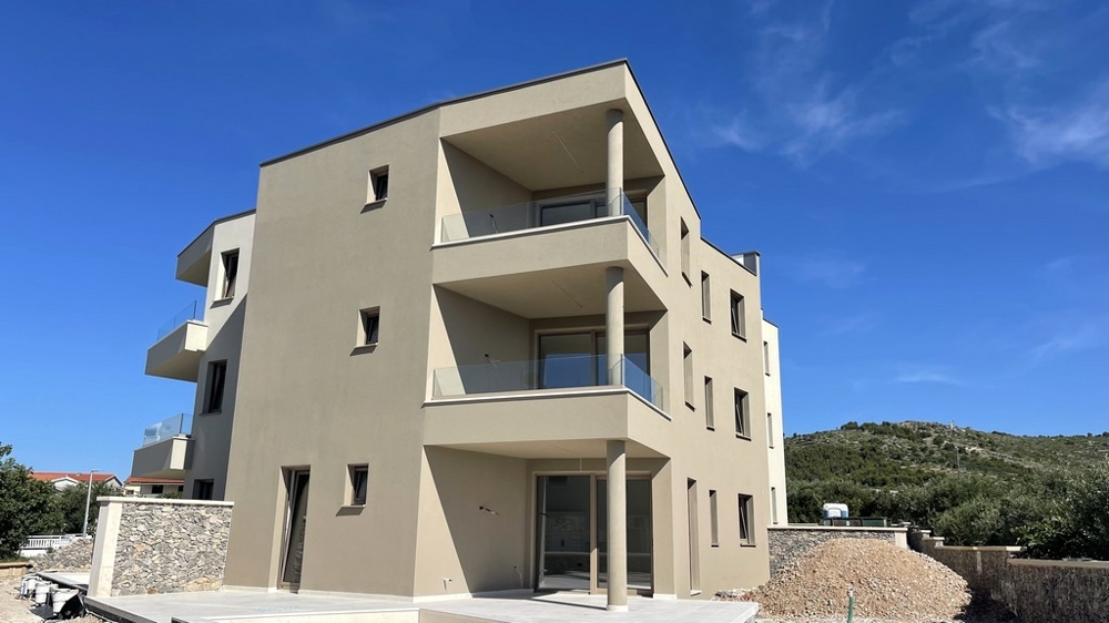 Rear view of the new building in Tribunj with a view of the surrounding area