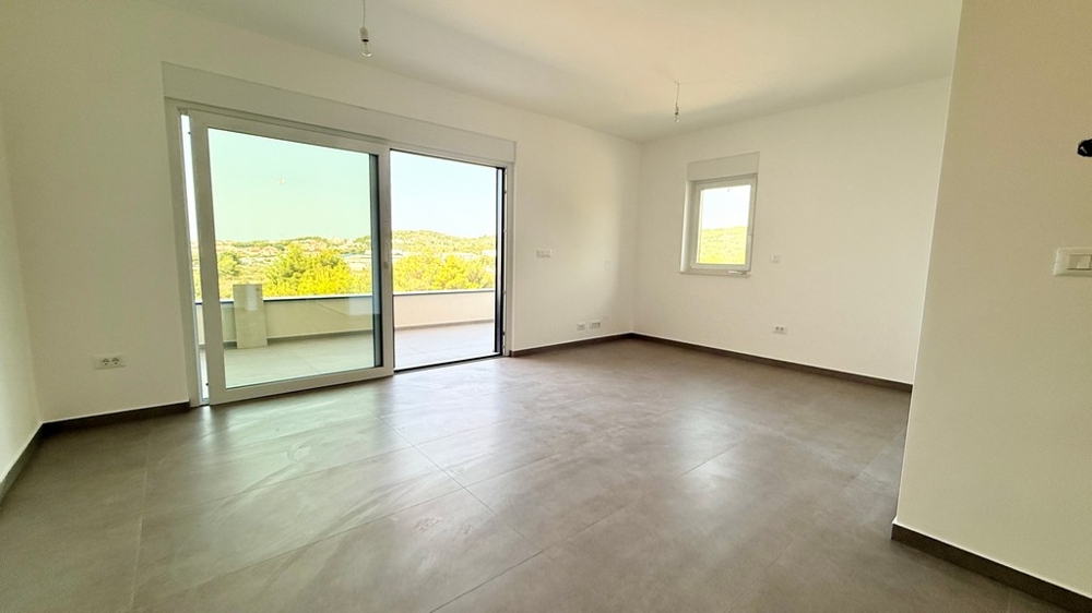 Living room with exit to the terrace in the maisonette apartment A4107 Vodice