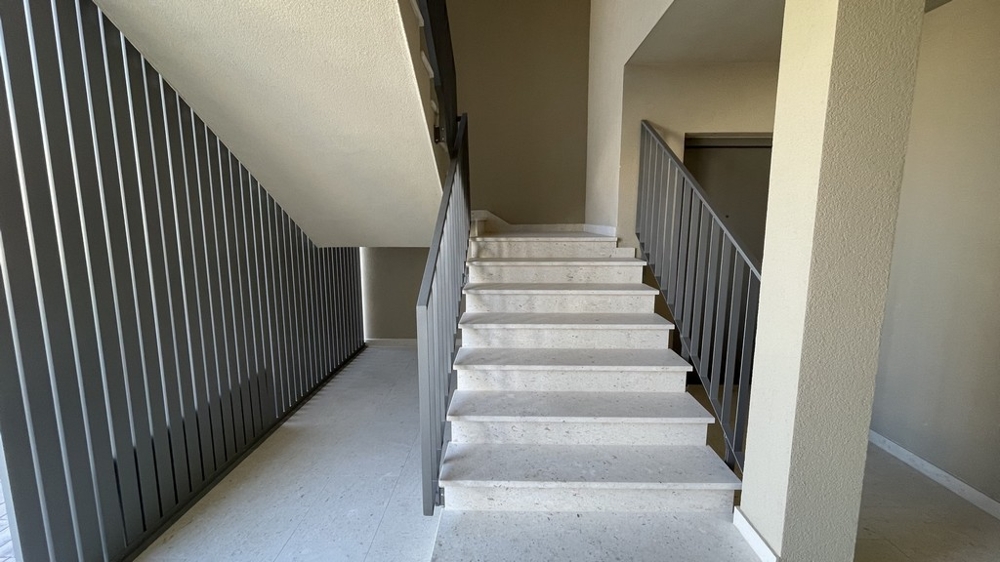 Staircase with stone steps in the new building in Vodice