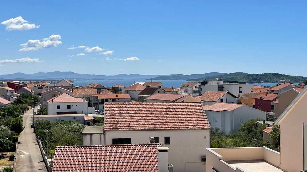 Sea view from the penthouse in Vodice over the city roofs
