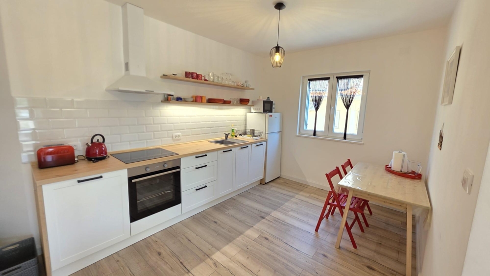 Kitchen with dining area and window