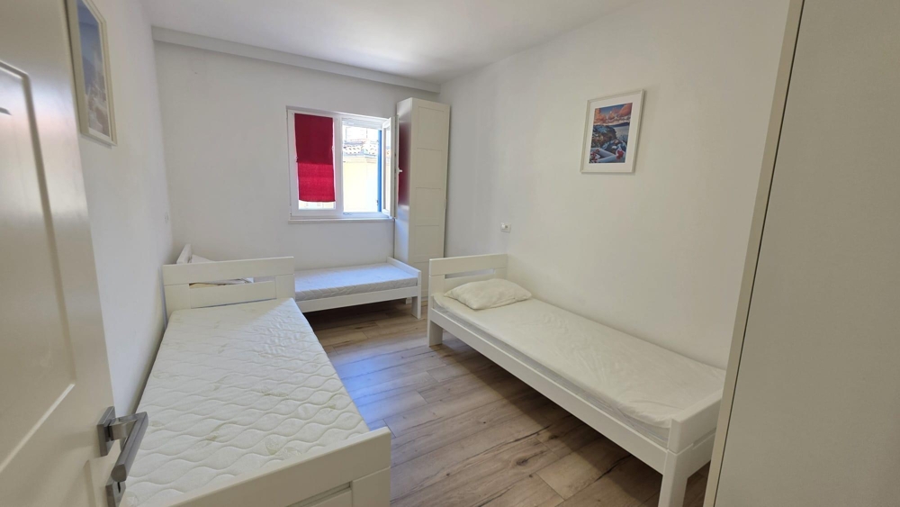 Second bedroom with two single beds