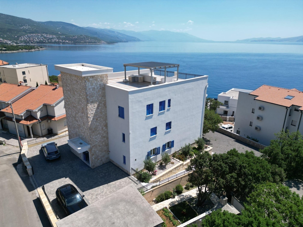 Aerial view of building with sea view in Povile