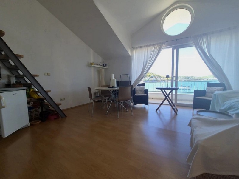 Living area with access to the loggia in Tisno