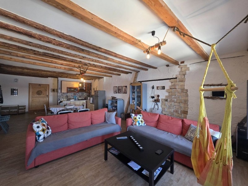 Living area with red sofa corner
