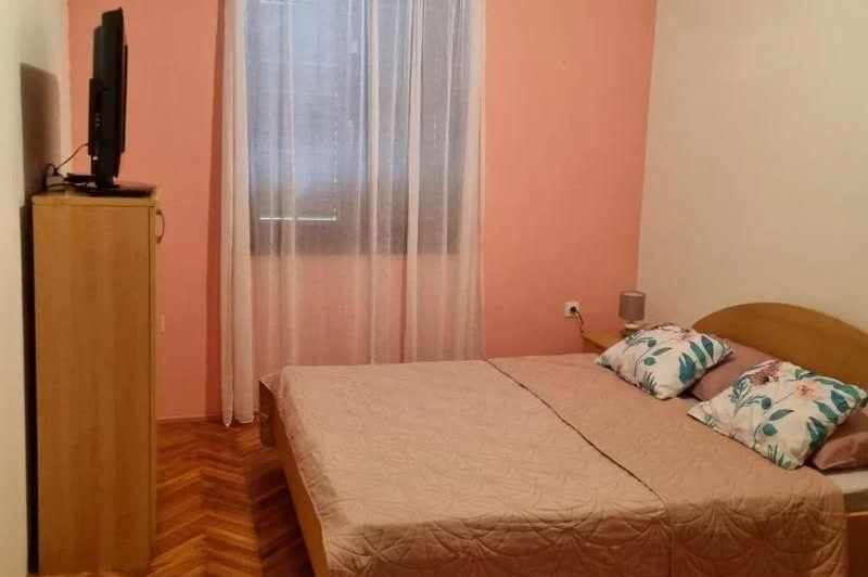Bedroom of the furnished apartment A4115 in Croatia