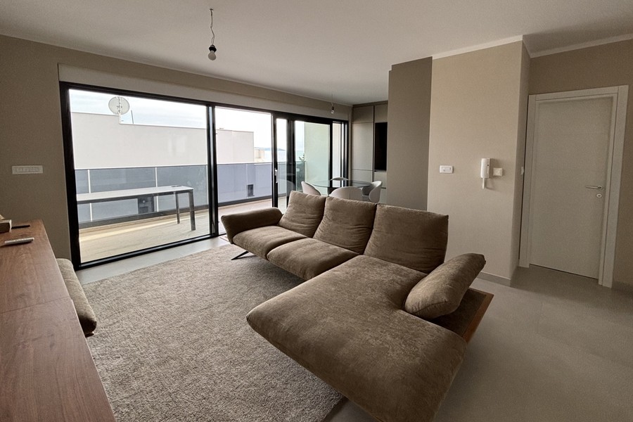 Living room of the penthouse with sofa area
