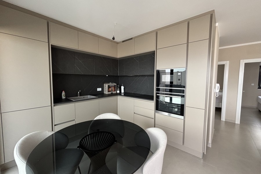 Kitchen with dining area in the penthouse on Ciovo