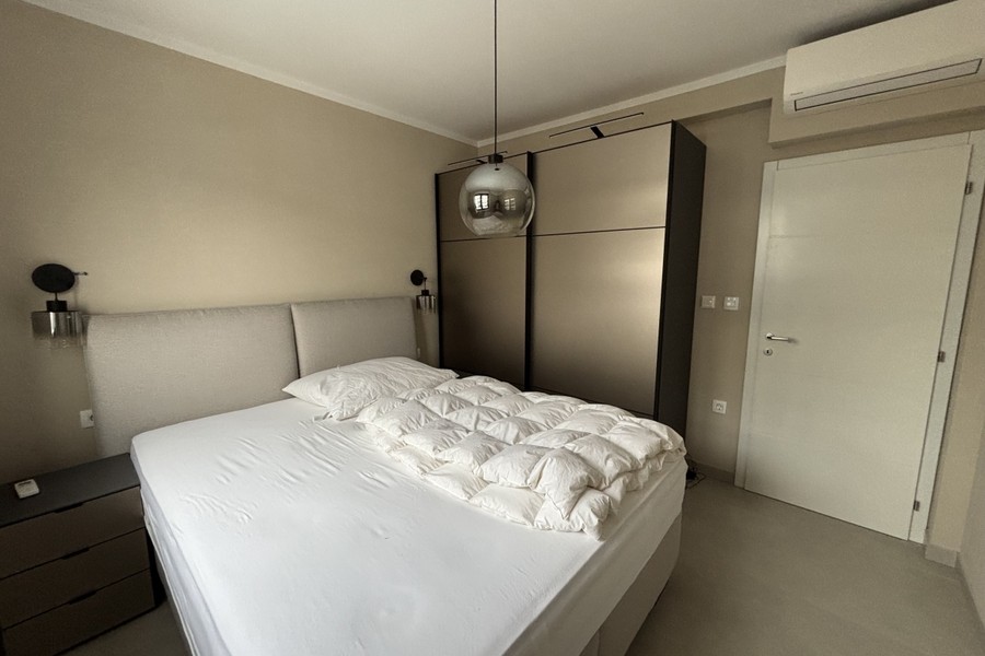 Bedroom of the penthouse in Okrug Gornji