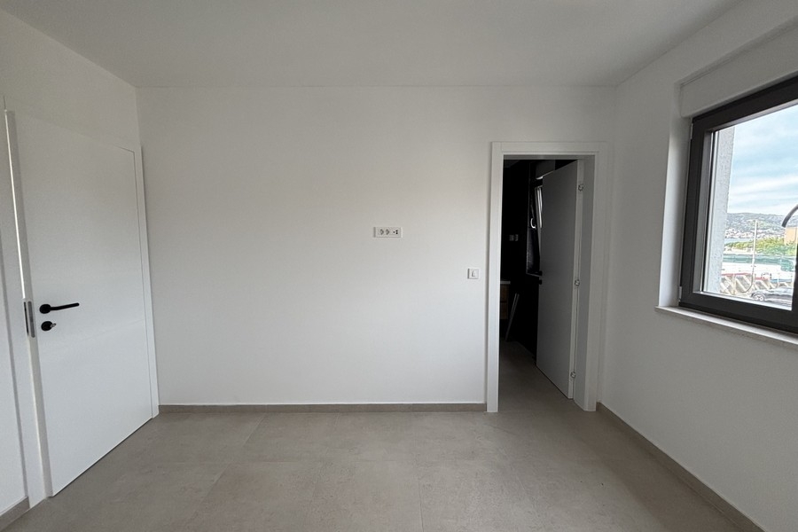 Bright second bedroom with window