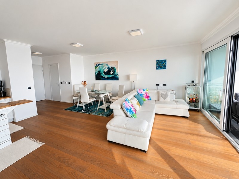 Bright living room with parquet floors