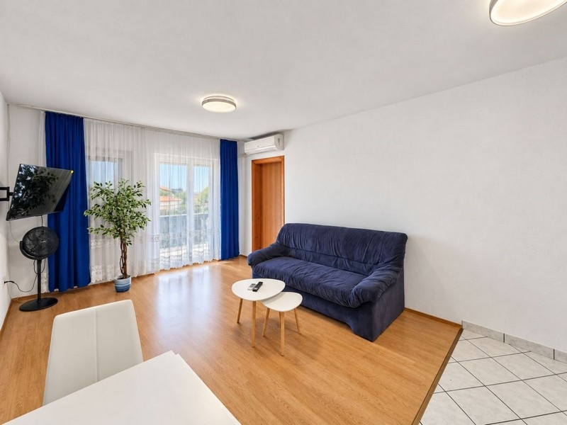 Bright living area with access to the terrace