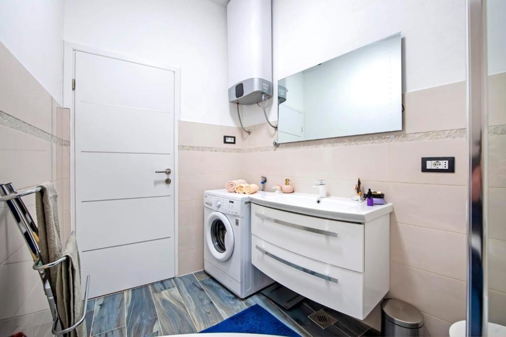 Bathroom with vanity and boiler