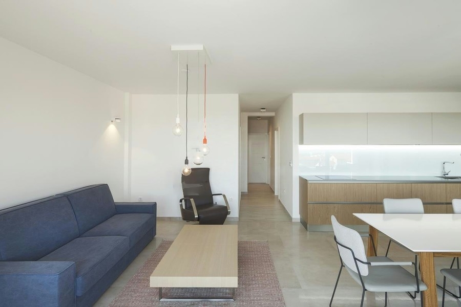 Living room with sofa and kitchenette