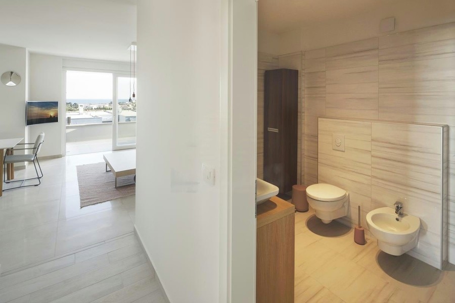 Bathroom with toilet and bidet