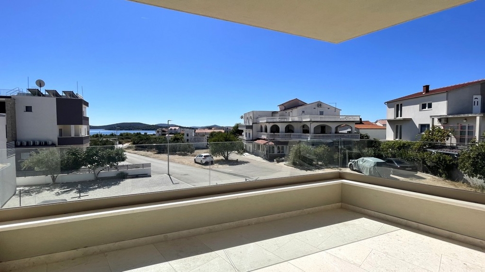 Covered terrace with a view over Tribunj to the sea