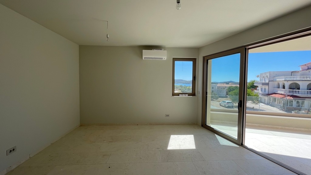 Living area with large glass front and air conditioning