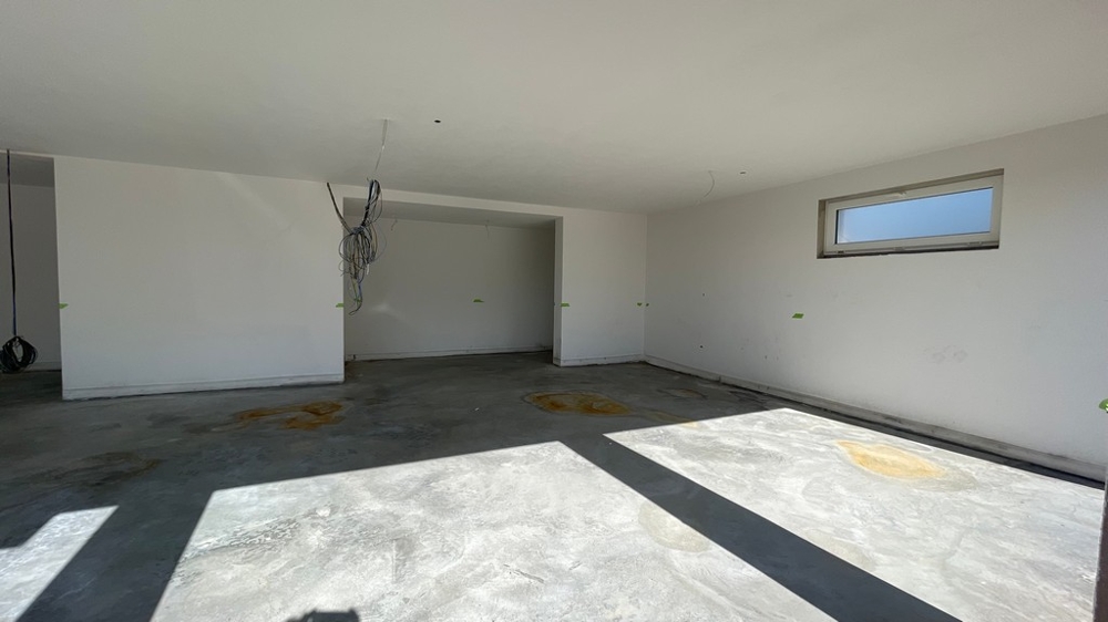 Open living and kitchen area under construction