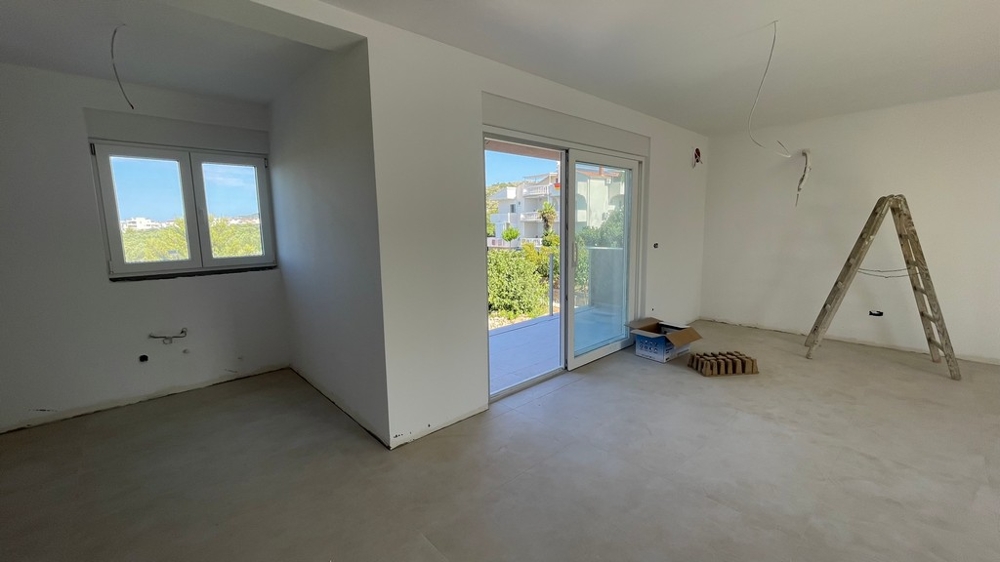 Living room with sliding door to the covered terrace