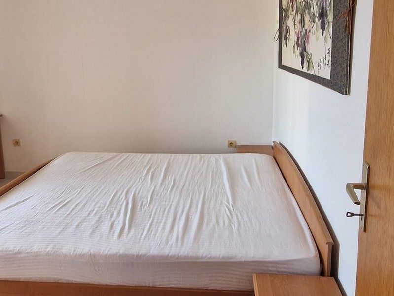 Bedroom with double bed and air conditioning