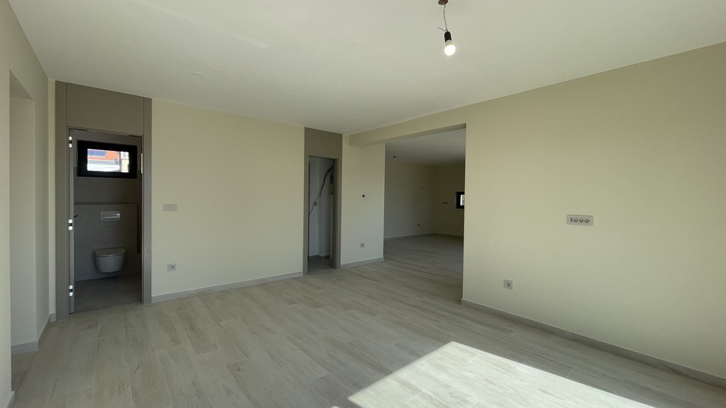 Living area with a view of the hallway