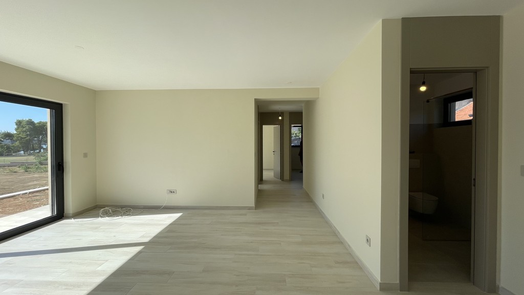 Living area with a view of the hallway