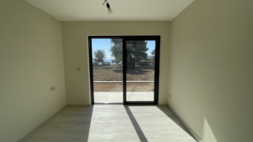 Bedroom with glass door to the outside