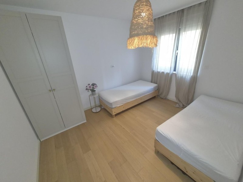 Second bedroom with two single beds