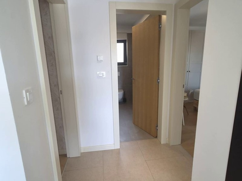 Hallway with a view of the rooms