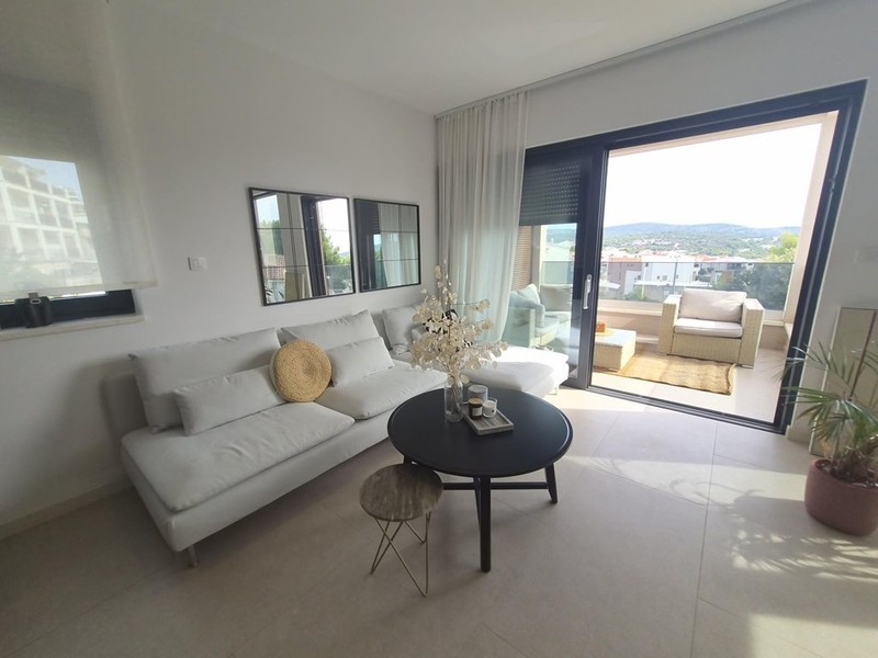 Sofa in front of the large patio door
