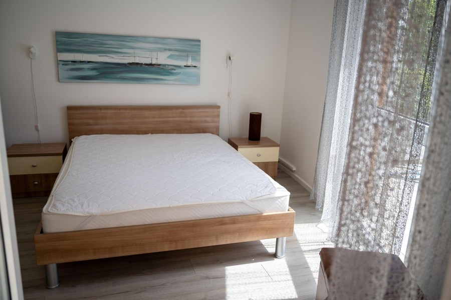 Bedroom with wooden bed