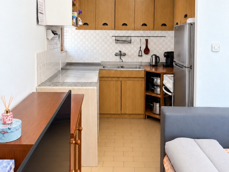 Kitchen with a view of the living area