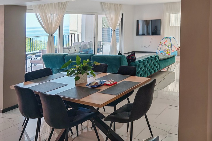 Open-plan living area with dining table