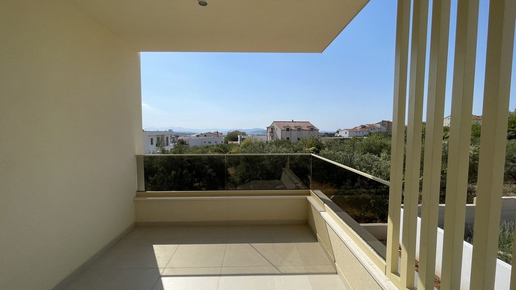 Covered terrace of an apartment on the first floor