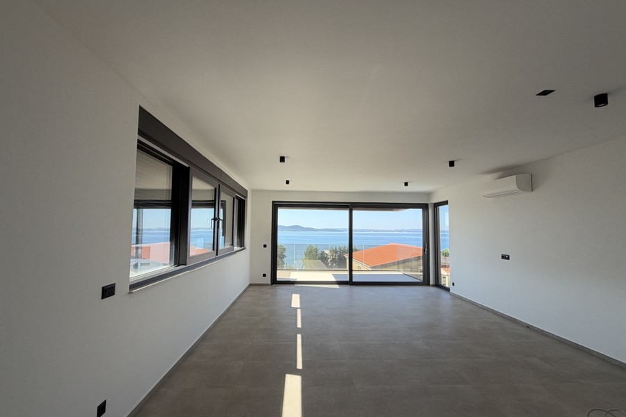 Bright living room with view of the sea