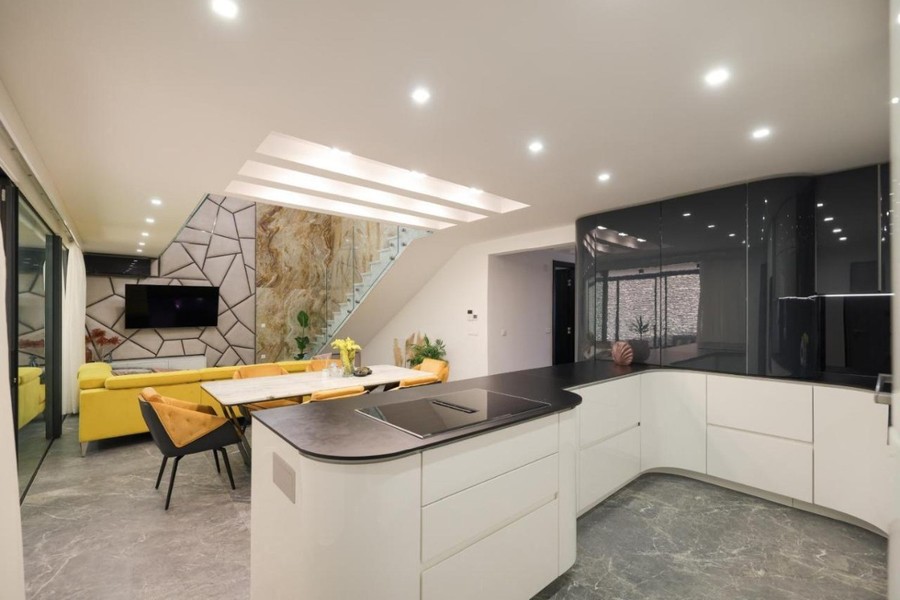 Modern kitchen with dark worktop