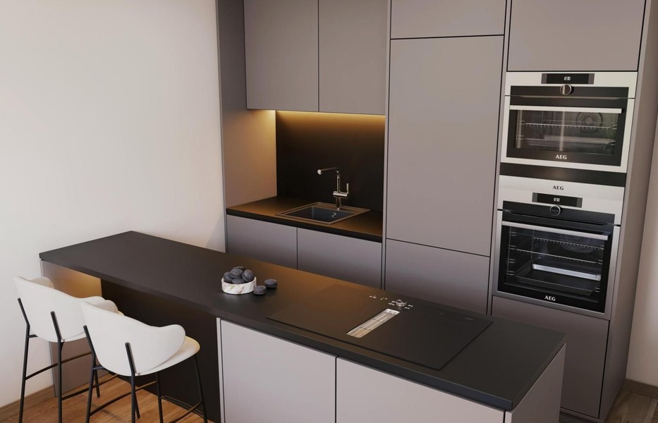 Modern kitchen with cooking island, bar stools and built-in ovens