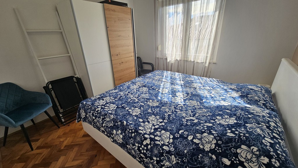 Second bedroom with armchair
