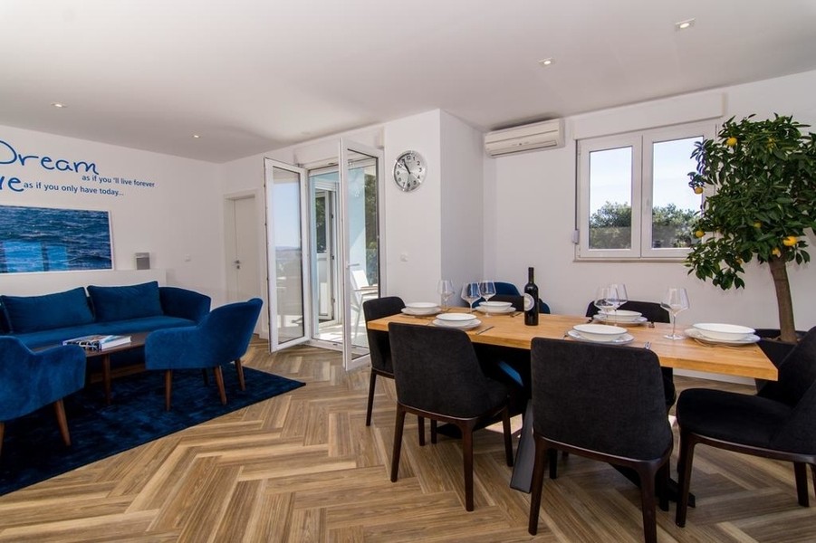 Open-plan living and dining area with dining table