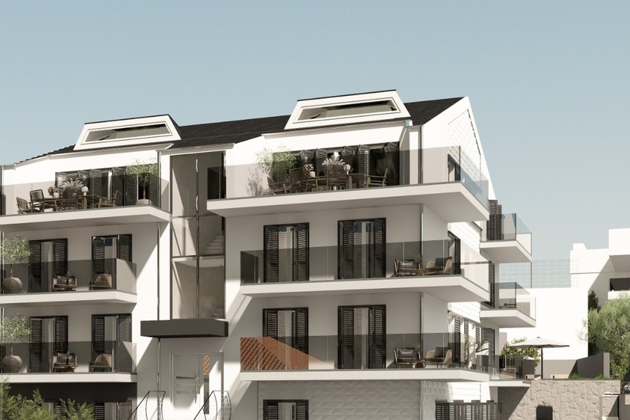 Residential building with three floors and dormer windows
