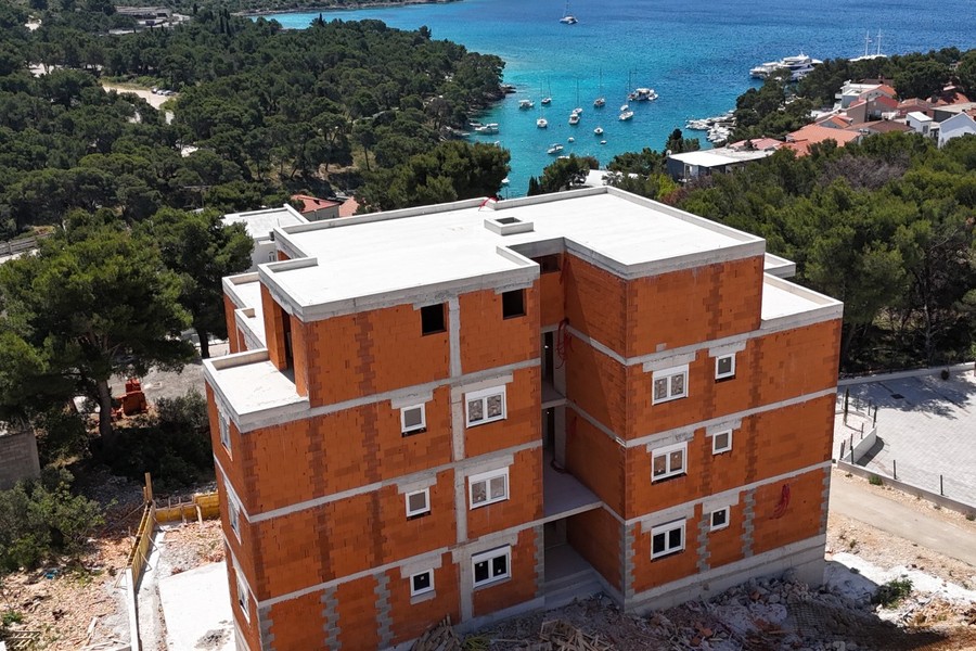 Residential building under construction with view of the bay