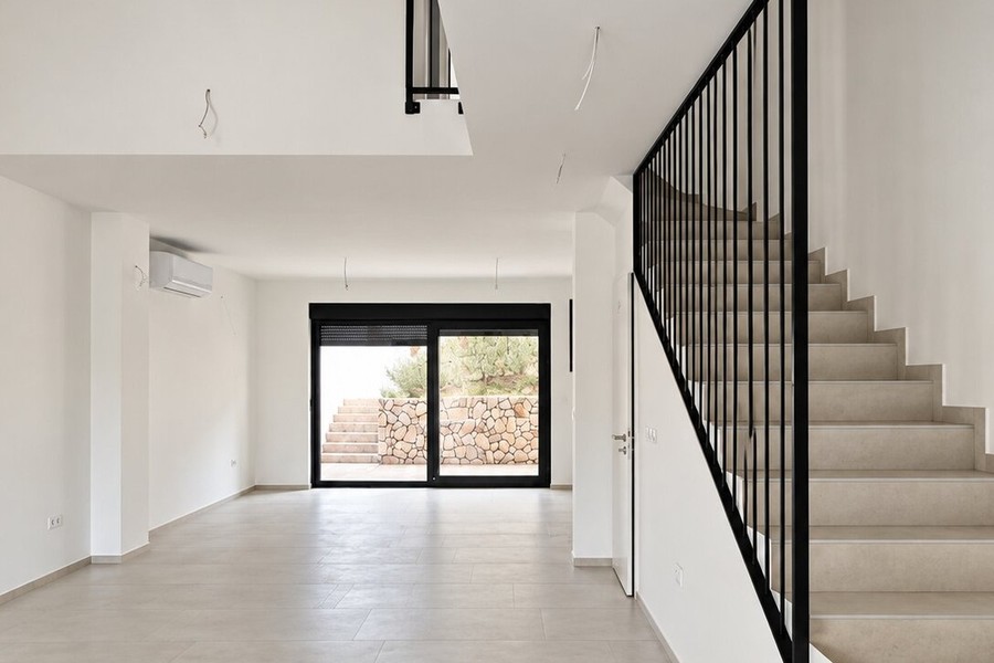Living room with staircase to the upper floor
